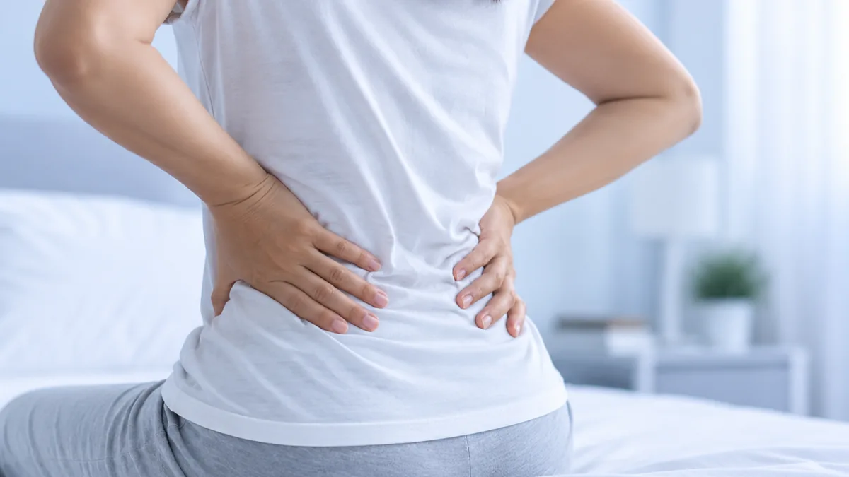 Lumbar Spondylosis: Why Your Lower Back Feels Stiff and Achy